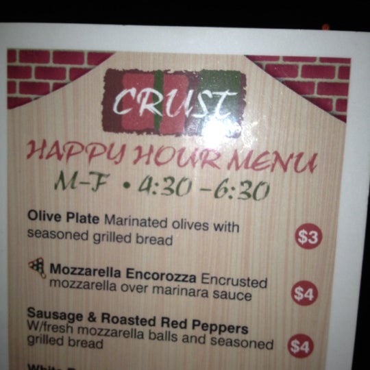 Foto tomada en Crust Pizza &amp; Wine Cafe  por Christopher K. el 3/16/2012