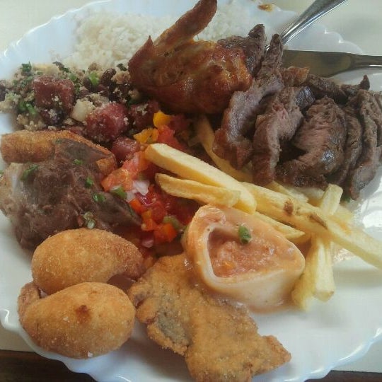 Photo taken at Churrascaria Beija Flor by Andrew N. on 6/21/2012