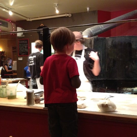Photo taken at Proto&#39;s Pizza-North Boulder - Broadway by Greg D. on 11/29/2011