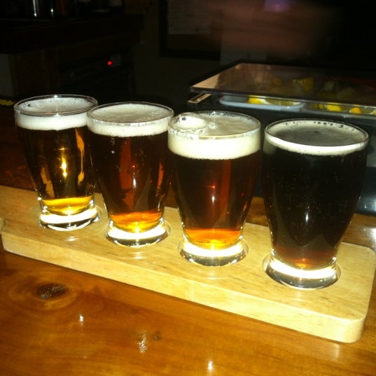 Photo taken at Wisconsin Brewing Tap Haus by Christopher T. on 3/30/2012