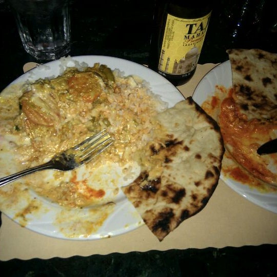 Photo taken at New Delhi Indian Restaurant by Ryan K. on 11/26/2011