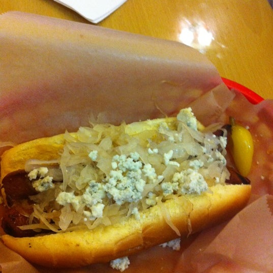 Photo taken at The Slaw Dogs at the Village by Dean C. on 8/28/2011