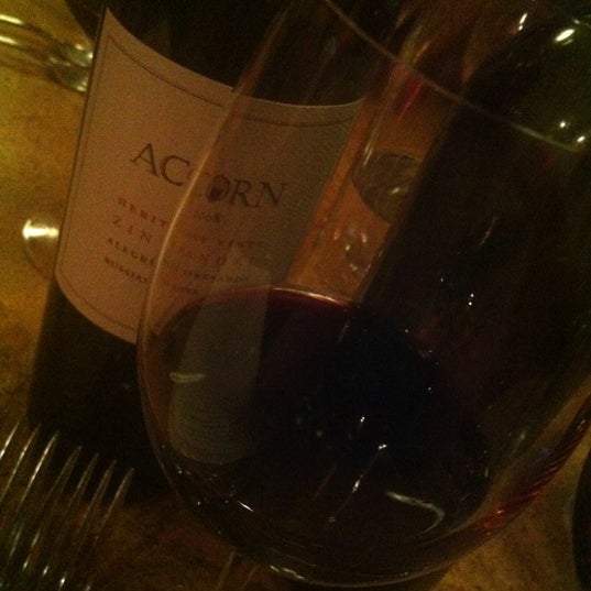 Photo taken at Zin Restaurant &amp; Wine Bar by Katie A. on 8/12/2012