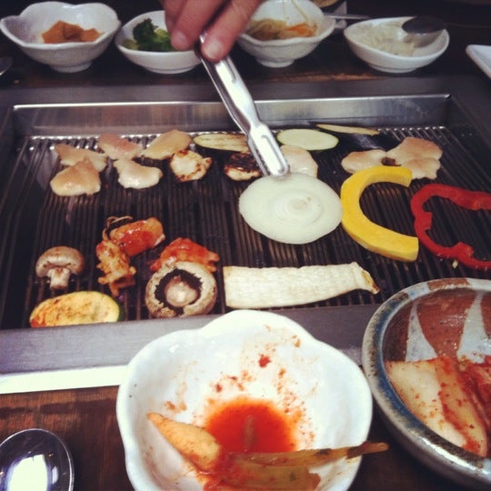 Photo taken at Wharo Korean BBQ by Sara T. on 5/7/2012