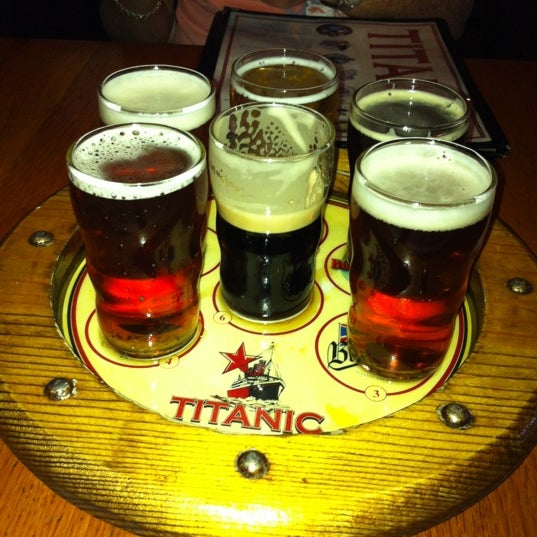 Photo taken at Titanic Restaurant &amp; Brewery by Nefterina W. on 8/11/2012