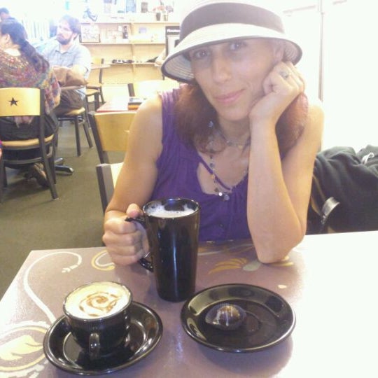 Photo taken at Firestorm Cafe &amp; Books by Rob M. on 6/6/2012