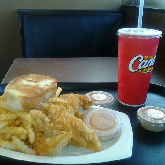 Photo taken at Raising Cane&#39;s Chicken Fingers by Whitney H. on 3/21/2012