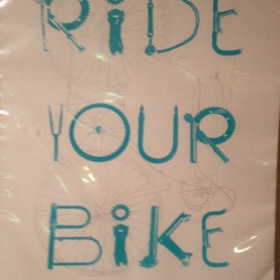 Photo taken at Mello Velo Bicycle Shop and Café by Chris F. on 8/1/2012