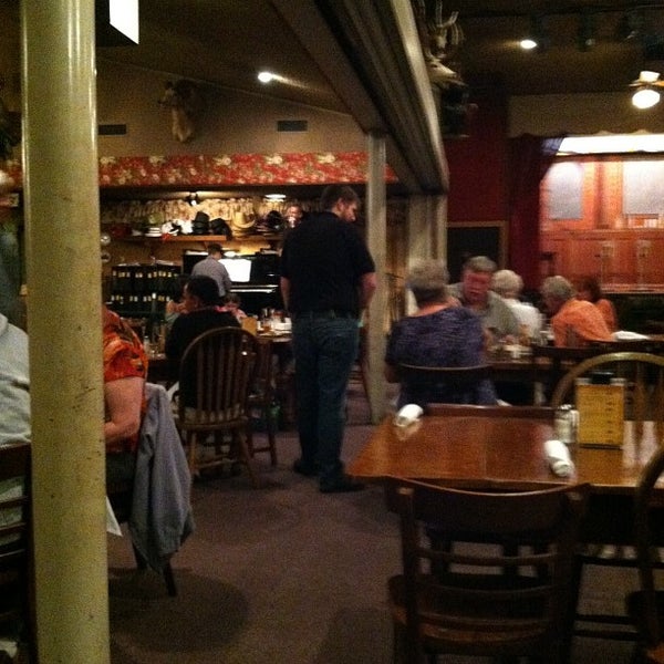 Photo taken at Black Bart&#39;s Steakhouse by Maria A. on 7/26/2012