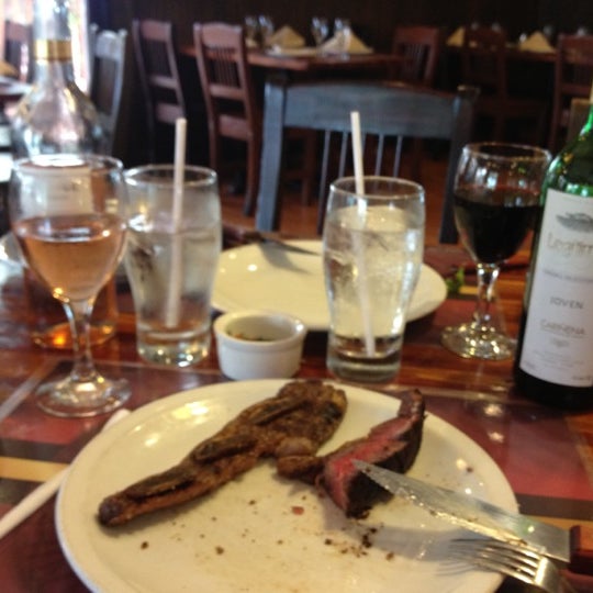 Photo taken at The Knife Restaurant Argentinian Steakhouse by Melodie D. on 6/23/2012