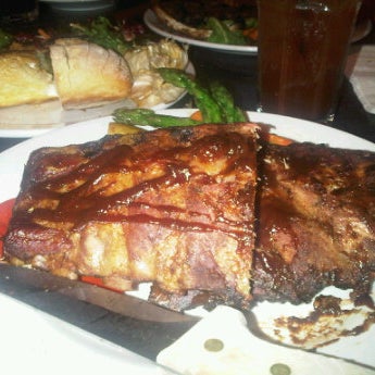 Photo taken at Watershed Grill by Bridget G. on 7/3/2012