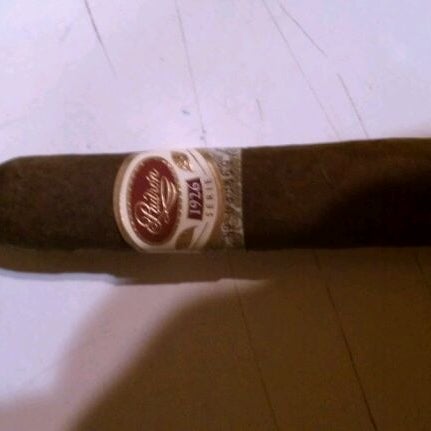 Photo taken at Crossroads Cigars by Nick C. on 1/22/2012
