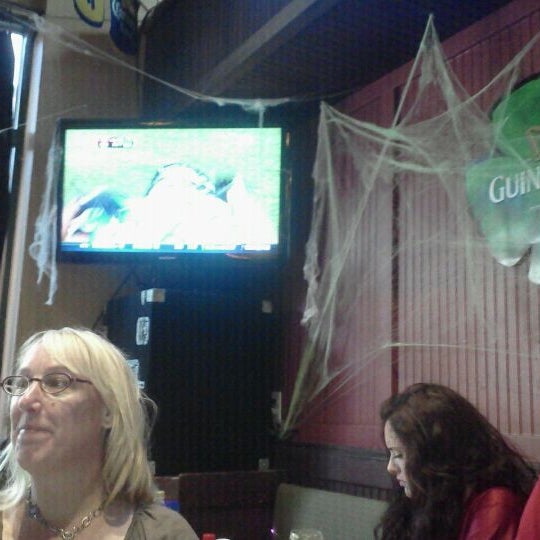 Photo taken at Rosie McCann&#39;s Irish Pub &amp; Restaurant by Kelly T. on 10/16/2011