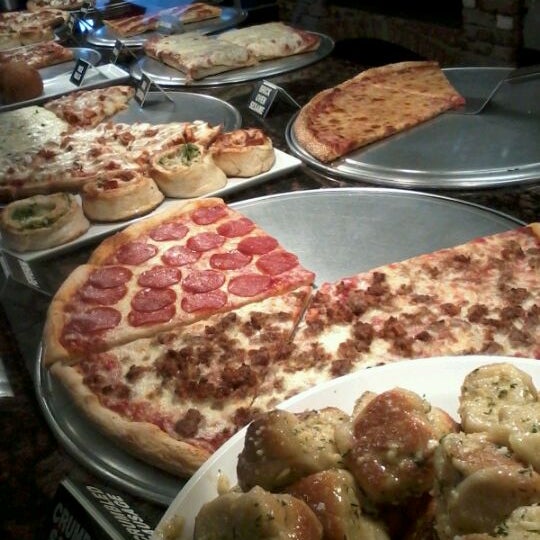 Photo taken at Richie&#39;s Pizza by Jonny M. on 11/30/2011