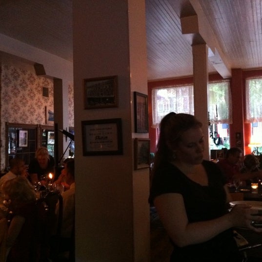 Photo taken at Grand Taverne Restaurant &amp; Lounge by Justin H. on 6/26/2011