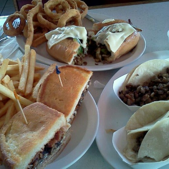 Photo taken at Angelo&#39;s Burgers by Gordon P. on 1/21/2012