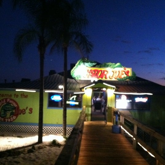 Photo taken at Gator Joe&#39;s Beach Bar &amp; Grill by Rusty C. on 11/12/2011