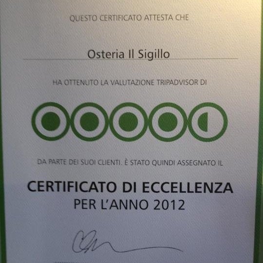 Photo taken at Osteria Il Sigillo by osteria i. on 7/30/2012