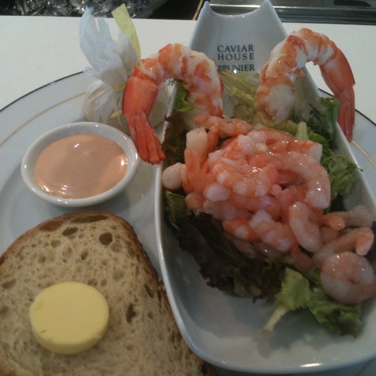 Photo taken at Caviar House &amp; Prunier Seafood Bar by Damon R. on 1/14/2011