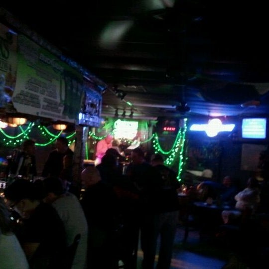 Photo taken at O&#39;Shucks Pub &amp; Karaoke Bar by Blanche T. S. on 12/1/2011