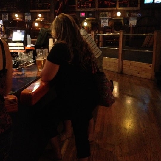 Photo taken at Scorekeepers Sports Grill and Pub by T Z. on 8/26/2012