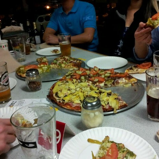 Photo taken at Mission Pizza &amp; Pub by D-ta L. on 3/31/2012