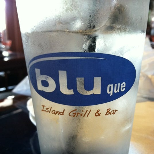 Photo taken at Blu Que Island Grill by Tiffany L. on 6/13/2012