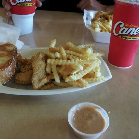 Photo taken at Raising Cane&#39;s Chicken Fingers by Kaylee M. on 5/27/2012