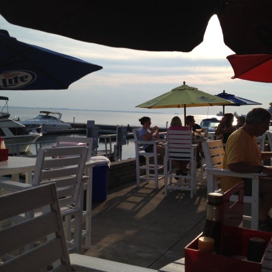 Photo taken at Dockers Waterfront Restaurant &amp; Bar by Heather M. on 8/8/2012