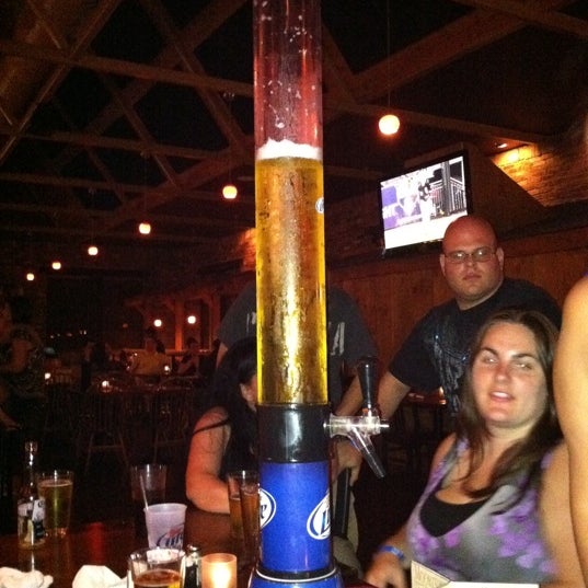 Photo taken at Moore&#39;s Tavern &amp; Sports Bar by Shantel S. on 6/11/2011