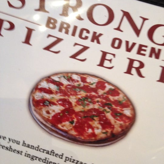 Photo taken at Strong&#39;s Brick Oven Pizzeria by Tony B. on 6/3/2012