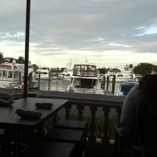 Photo taken at Carmine&#39;s Ocean Grill and Sushi Bar by Kelly H. on 5/22/2012