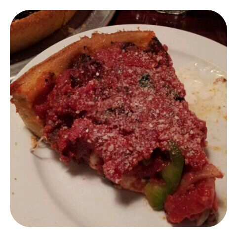 Photo taken at Kylie&#39;s Chicago Pizza by Julien C. on 3/17/2012
