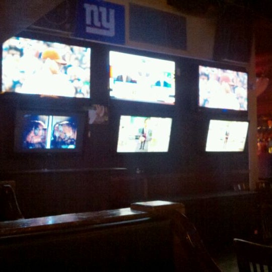 Photo taken at The Downtown Sports Bar &amp; Grill by Brandon G. on 10/7/2011