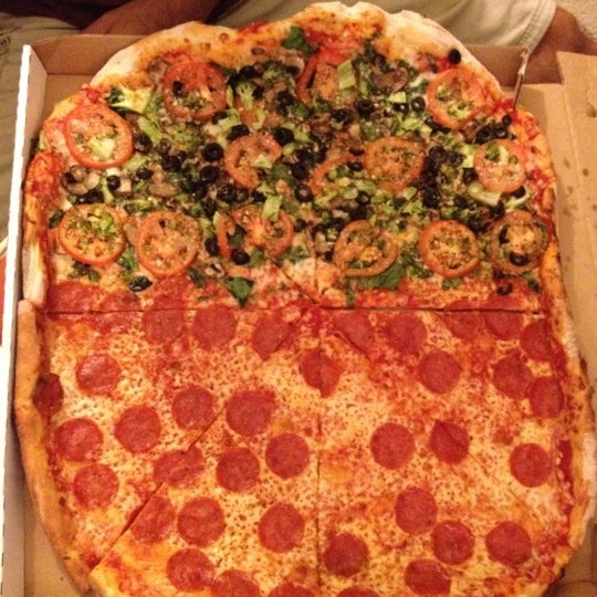 Photo taken at Kaimuki&#39;s Boston Style Pizza by Tina I. on 9/2/2012