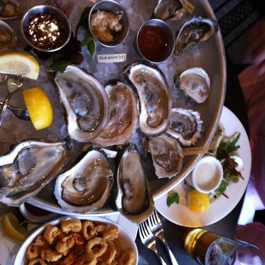 Photo taken at Ruby&#39;s Oyster Bar &amp; Bistro by HiDe T. on 3/23/2012