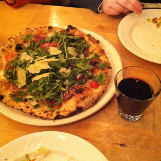 Photo taken at Tutta Bella Neapolitan Pizzeria by Tanja S. on 2/9/2011