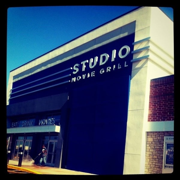 Photo taken at Studio Movie Grill Wheaton by Charlotte E. on 6/7/2012
