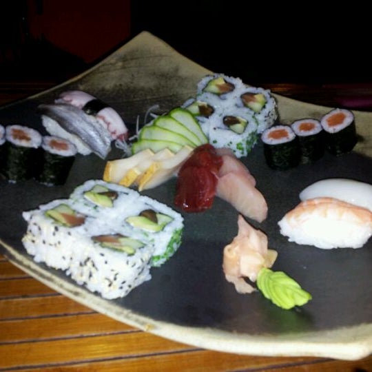 Photo taken at Kynoto Sushi Bar by Kumkuat46 on 9/9/2011