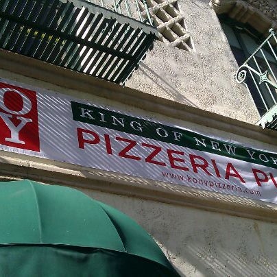 Photo taken at King of New York Pizzeria Pub by Iliana on 4/28/2012