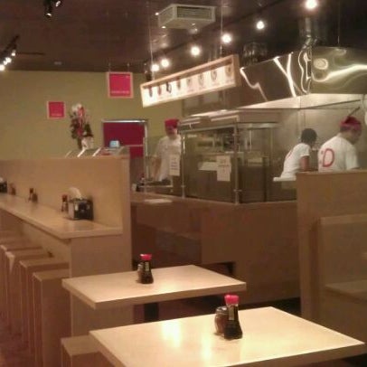 Photo taken at U:DON Fresh Japanese Noodle Station by Chinky C. on 12/27/2011