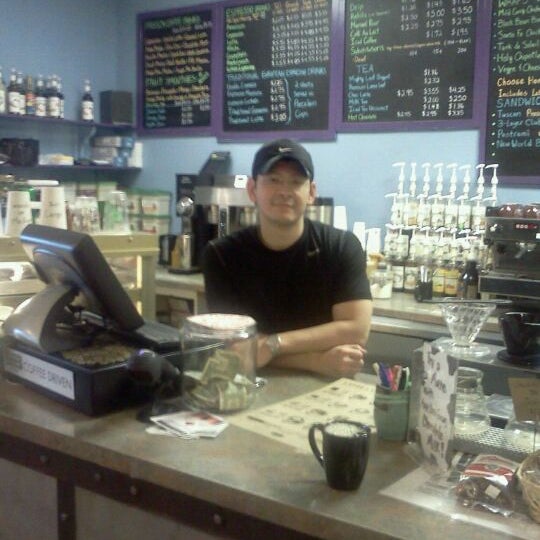 Photo taken at New World Coffee House by Whitney H. on 1/25/2012