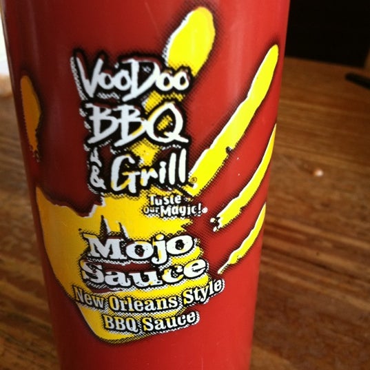 Photo taken at VooDoo BBQ &amp; Grill Uptown by Lindsay J. on 12/5/2011