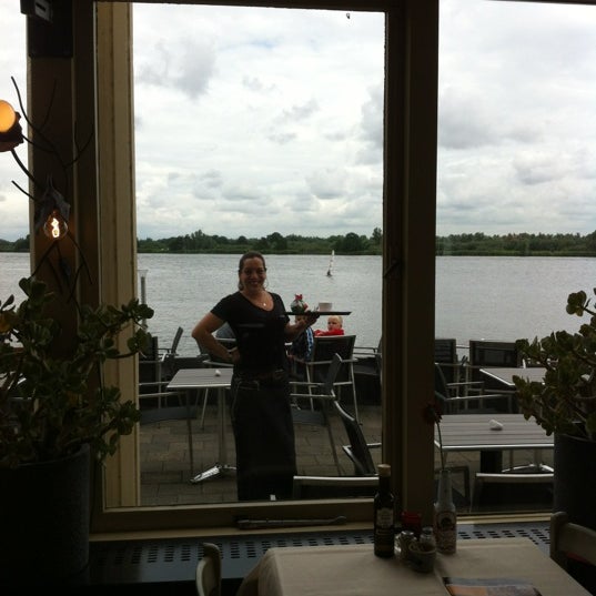 Photo taken at Het Panorama Restaurant/Grand-Café by Guido V. on 7/15/2012