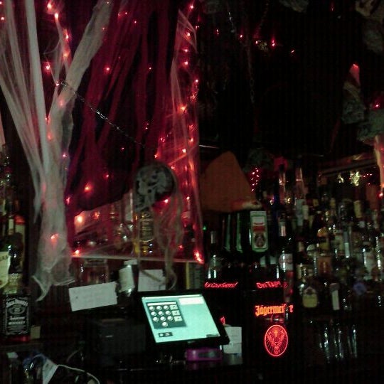 Photo taken at The Mad Hatter Pub &amp; Eatery by Jolie M. on 10/30/2011