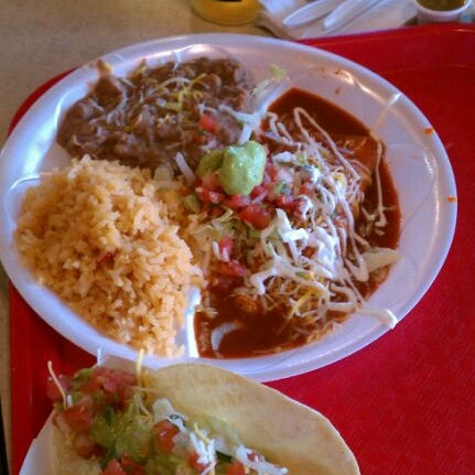 Photo taken at Taco Shop Mexican Grill by Lisandra on 5/4/2012