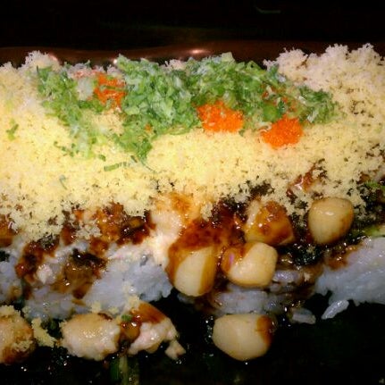 Photo taken at Sushi Delight by Miriam W. on 7/13/2012