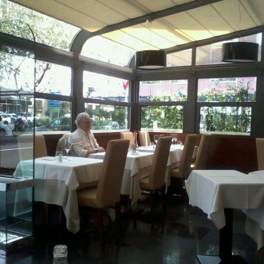 Photo taken at Il Giglio Rosso by Karina H. on 6/28/2012