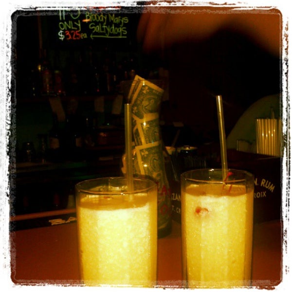 Photo taken at Lobo Del Mar Cafe by K Z. on 6/30/2012