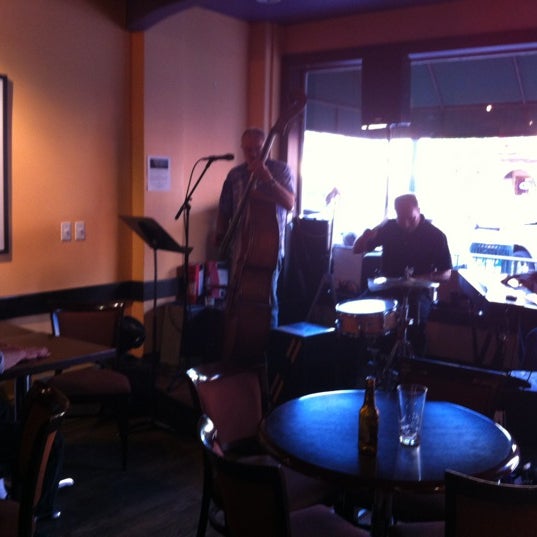 Photo taken at Rico&#39;s Cafe &amp; Wine Bar by Russ W. on 5/18/2012